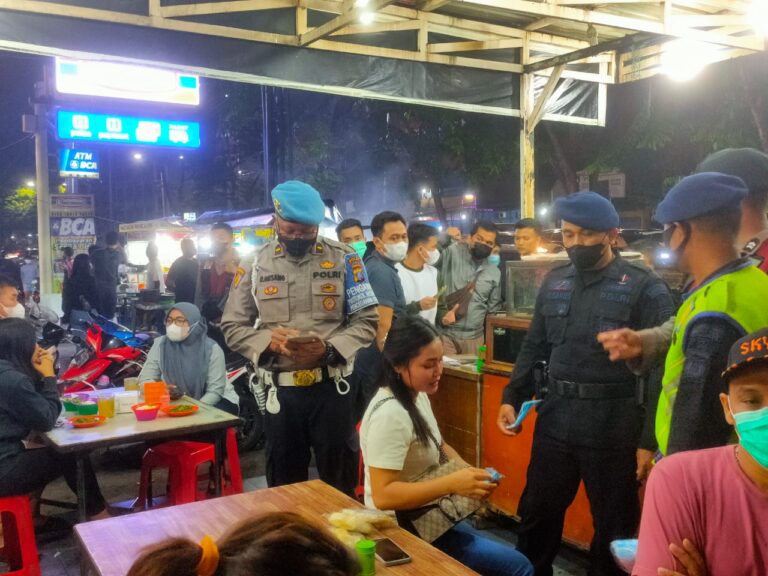 Brimob Polda Sumut Sampaikan Imbauan Prokes